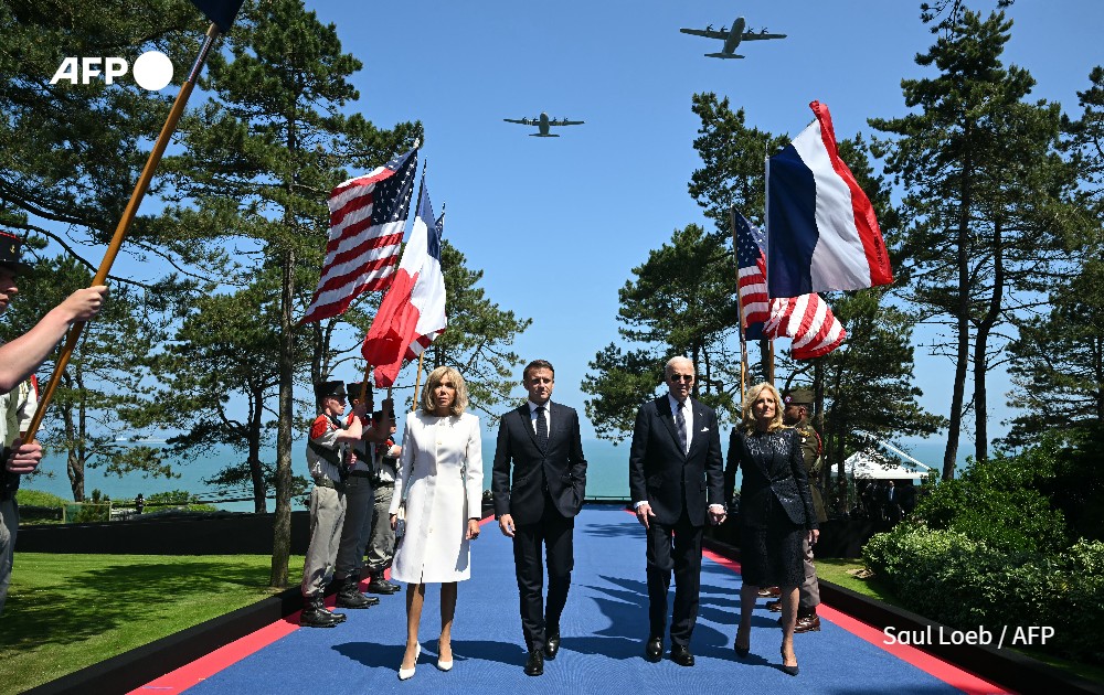 Aircraft fly over as US President and France's President and their wifes