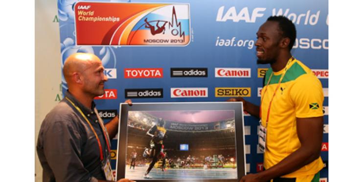 Rencontre entre Olivier Morin, photographe de l’AFP et "Bolt la Foudre"